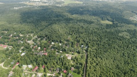Aerial Advance Downward Rotation over Forest