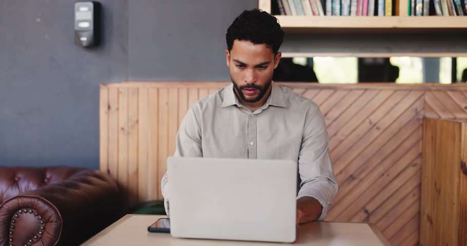 Pain, stress and man in cafe, laptop for online submission and burnout for project delay. Copywriting, frustrated and person in restaurant, migraine and tired with pc and email for article rejection