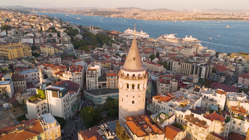 Cinematic aerial shot of Galata Tower at sunset in Istanbul, Turkey