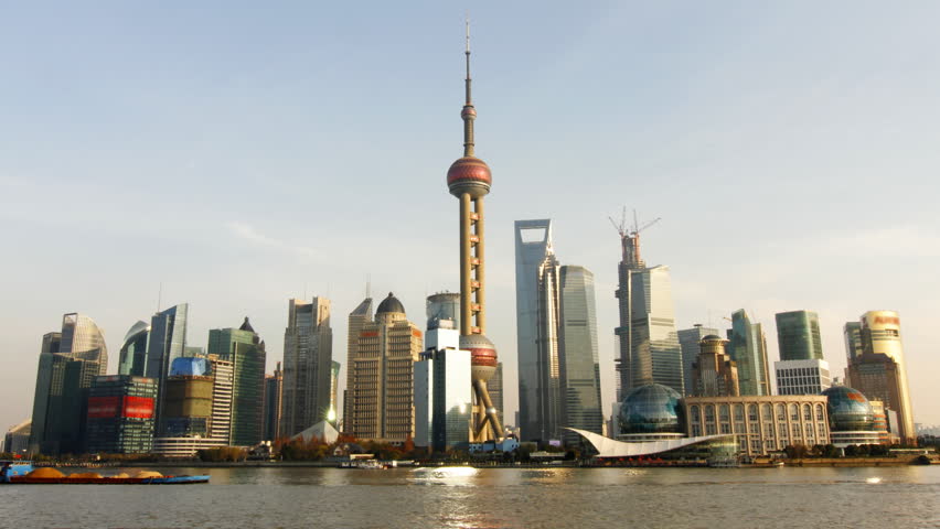 Time lapse of Shanghai skyline and busy Huangpu river - Shanghai, China.