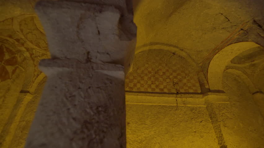 Cinematic shot of historic religious art in cave churches at Goreme Open Air Museum in Cappadocia, Turkey