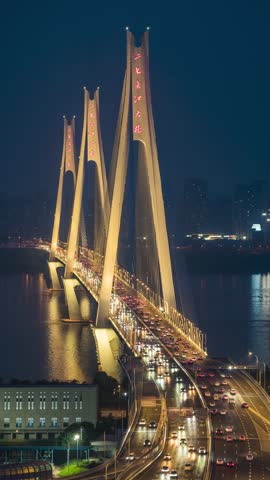 Night Time-lapse of Traffic Flow on Erqi Yangtze River Bridge in Wuhan, Hubei, China