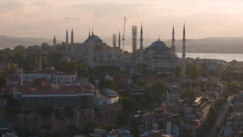 Cinematic aerial shot of historic Faith District at sunrise in Istanbul, Turkey