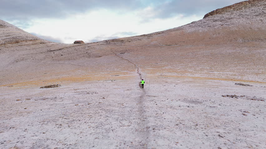 Drone view of Man Running to Remote Giosos Apostolidis Refuge on Mount Olympus, Greece, Endurance