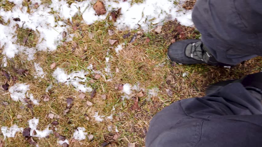 Man walking in winter boots 