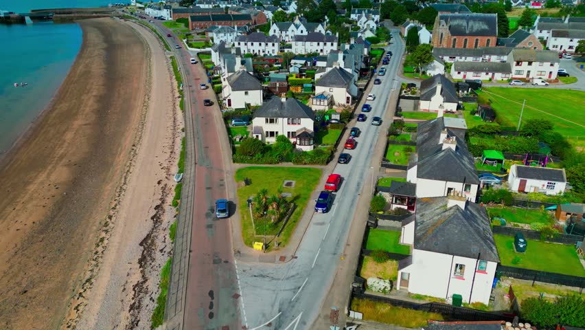 Drone footage showing offshore energy infrastructure near Nigg on the Cromarty Firth representing renewable energy development and industrial maritime activity.