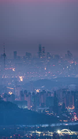 Panoramic view of Beijing, China, at sunrise, with smog and air quality concerns.