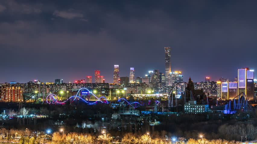 Beijing, China city skyline, Happy Valley night scene, modern architecture and amusement park lights intertwine