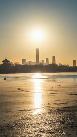 Sunset over Shichahai and the CBD skyline in Beijing, China, in one frame.
