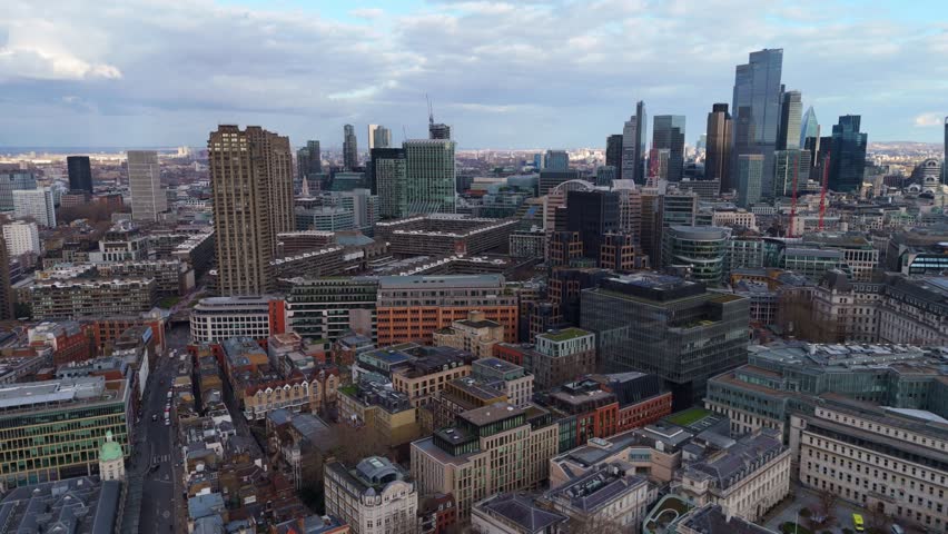 Establishing aerial shot of the City of London skyline and surrounding buildings