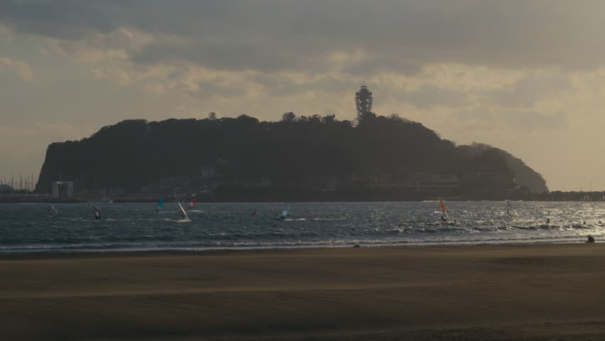 Idyllic beach landscape at Enoshima during sunset hour.