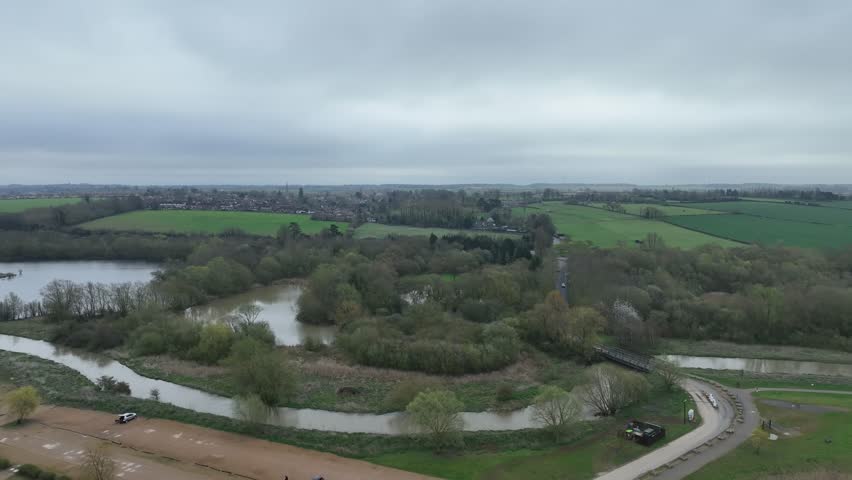 high altitude aerial panorama of Stanwick Lakes wetland and Nene Valley on overcast morning England
