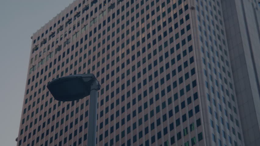Overhead perspective of Shinjuku urban core with office buildings.