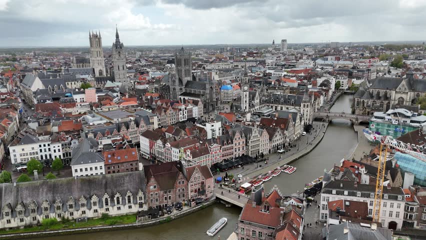 Aerial skyline of Ghent old town, Belgium, with famous landmarks "The Three Towers" (the medieval Belfry of Ghent, St. Bavo