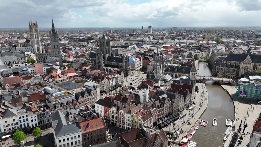 Aerial skyline of Ghent old town, Belgium, with famous landmarks "The Three Towers" (the medieval Belfry of Ghent, St. Bavo