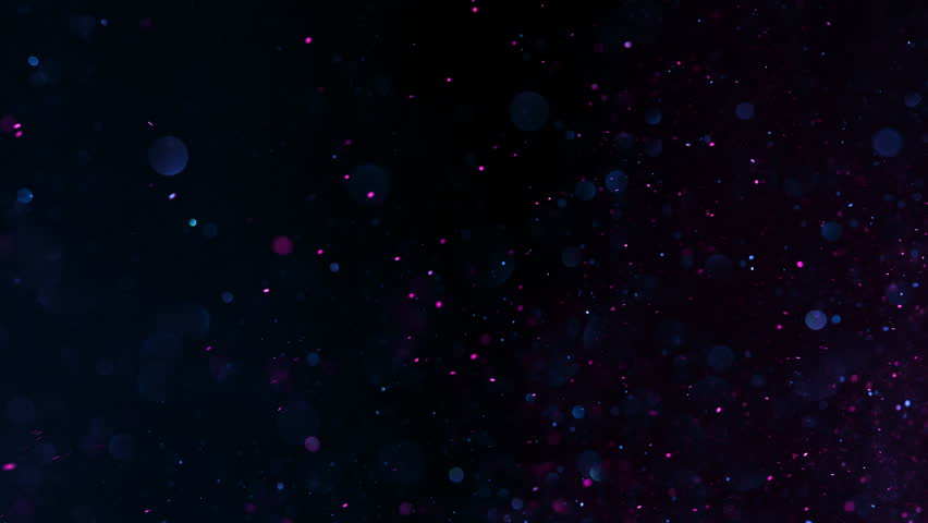 Super Slow Motion Shot of Neon Color Glitter Background at 1000fps.