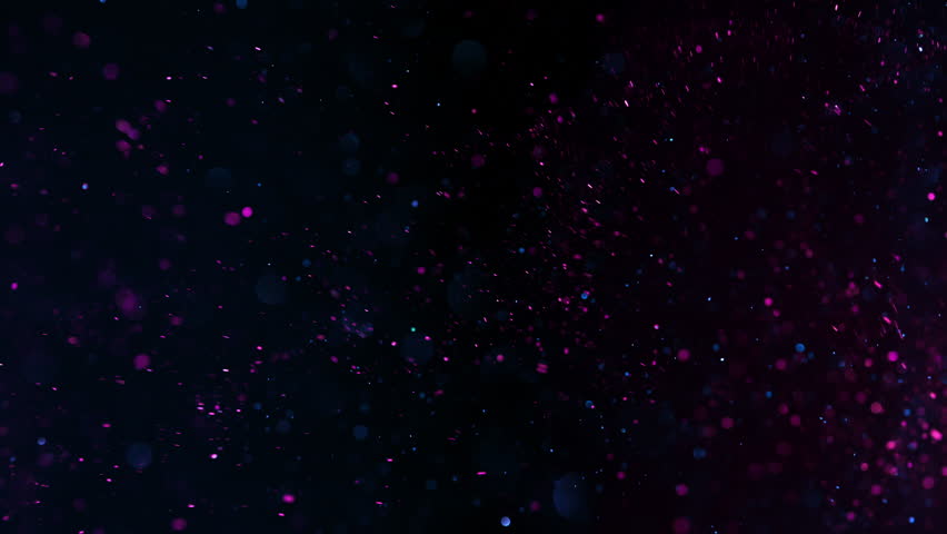 Super Slow Motion Shot of Neon Color Glitter Background at 1000fps.