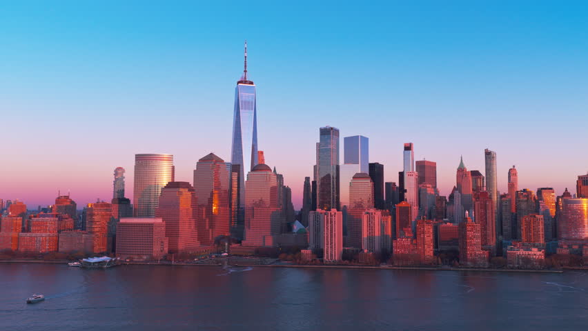 New York over Hudson River. NYC Manhattan with iconic towers, NYC. New York City panorama at dusk. New York in evening light. NYC aerial panorama. New York Manhattan skyscrapers.