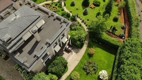 Drone Descending near Luxury Villa Garden
