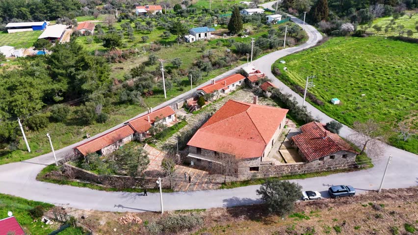 Aerial Drone View of Stone Houses Surrounded by Nature