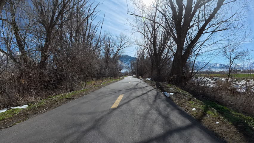 Immersive POV from winter riding recumbent tricycle on Spanish Fork River Trail in Salt Lake City area, Utah
