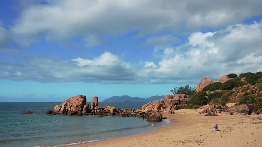 Horseshoe Bay Bowen Australia nature landscape swimming diving Airlie Proserpine beach sunny blue sky clouds Coral Sea Marina rock boulders Harbor View Great Barrier Reef coral fish Whitsunday Region