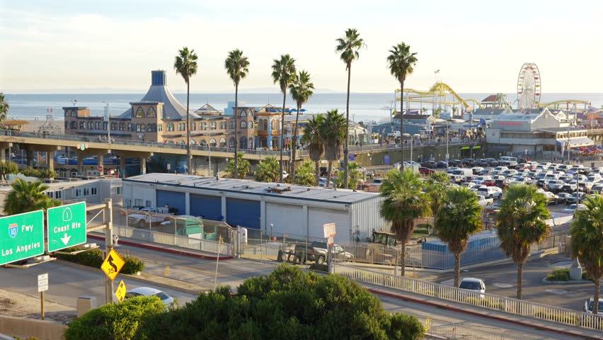 Santa Monica Pier with highway signs and ferris wheel California USA