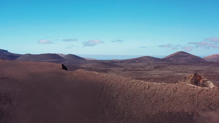 Aerial Drone View of Volcanic Landscape in Lanzarote, Canary Islands
Flying Over a Volcano Crater