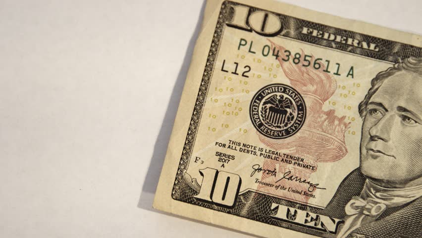 Ten US Dollar Bill. Close up of USA, American currency. Front side of the 10 $ dollar bill