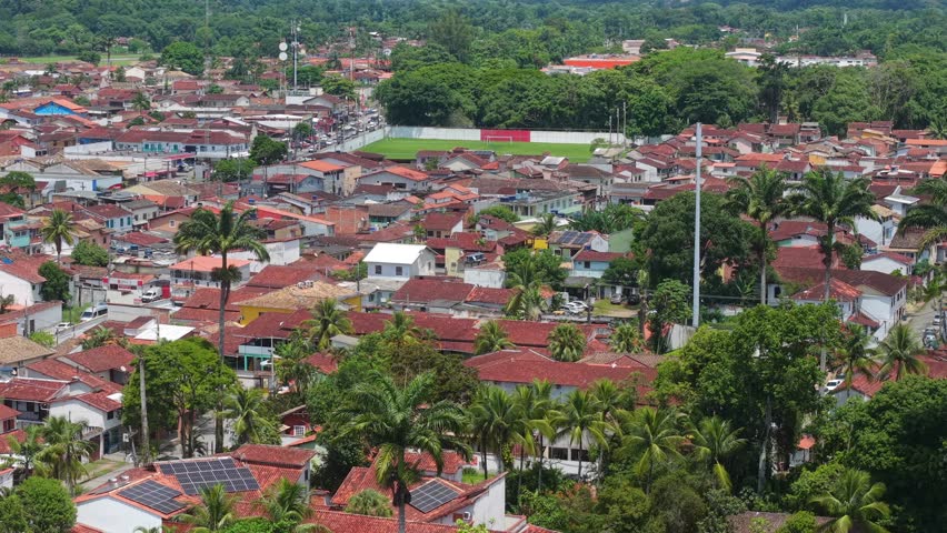 Distant drone shot of Estadio Mun. Mario Antonio Pompeu Nardelli football stadium at Lagoa Azul, Paraty, Rio de Janeiro, Brazil