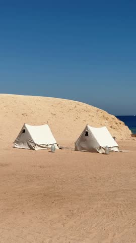 Vertical Shot of Desert Camping Tents on Sandy Dune near Red Sea Coast in Sinai Egypt