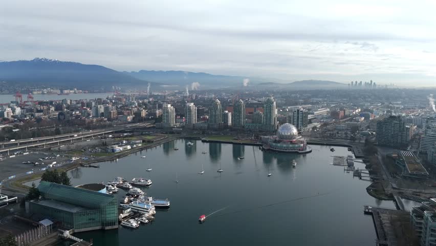 False Creek, Science World Museum, And Waterfront Residential Buildings In Vancouver, Canada. - aerial shot