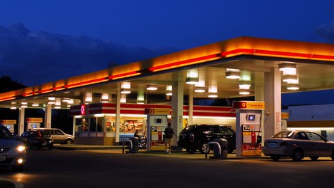 ITAP of a gas station on a rainy night (taken with original Google Pixel  from inside my car)