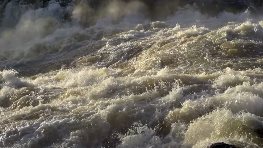 Powerful rushing water at Iguazu Falls on the border of Argentina and Brazil.