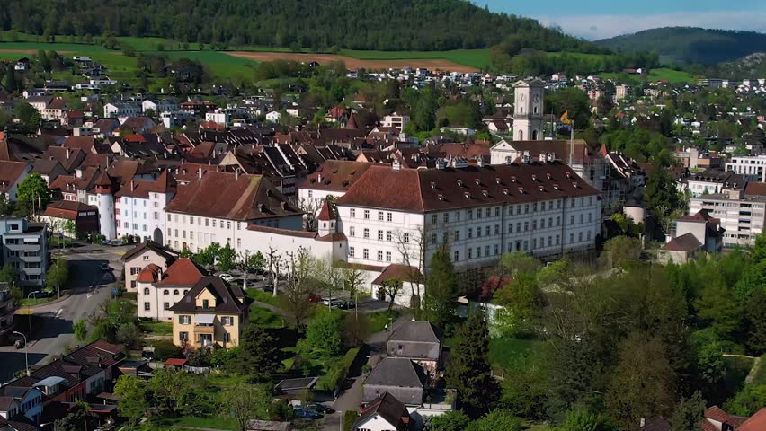 Aerial view around the old town of the city Delémont  in Switzerland on a sunny afternoon in summer.