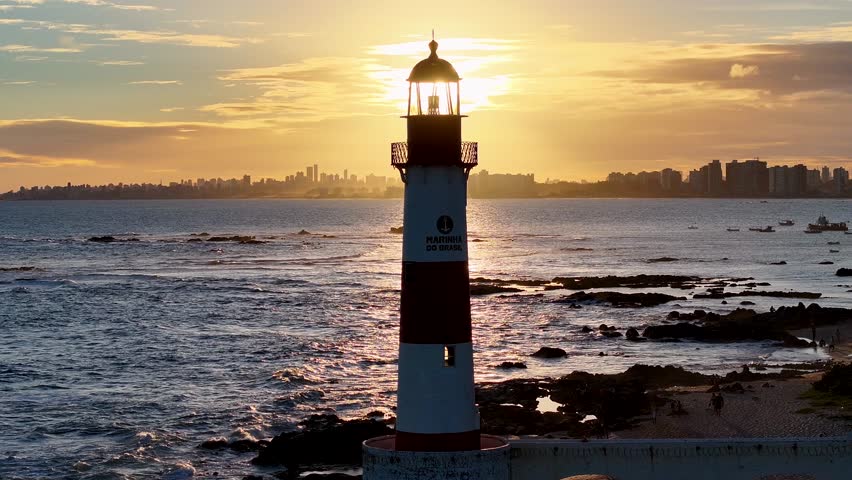 Sunset Beach In Salvador Bahia Brazil. Iconic Structure Of The Historic Lighthouse In A Coastal City. Sunrise Sky Beach Sea. Sunrise Outdoors Beach . Salvador Bahia.