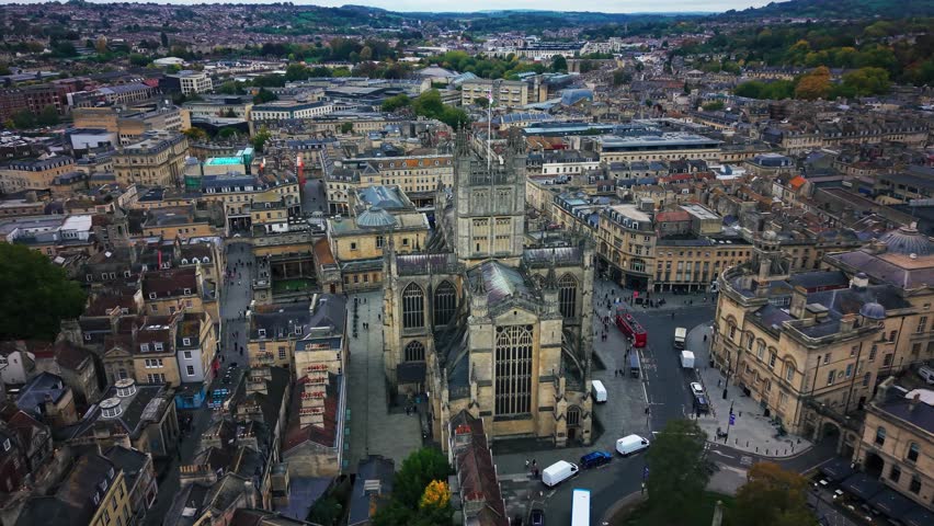 Drone aerial view of Bath Abbey and the Roman Baths complex in the historic city of Bath Somerset England