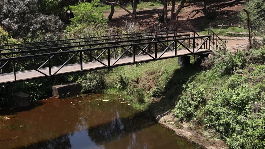 Maintain two points of contact with the stream bottom at all times- both feet or one foot and your pole. Keep your eyes on the far shore. You may become dizzy if you look down at the swirling water. Cross as a group when the water is especially swift or deep.