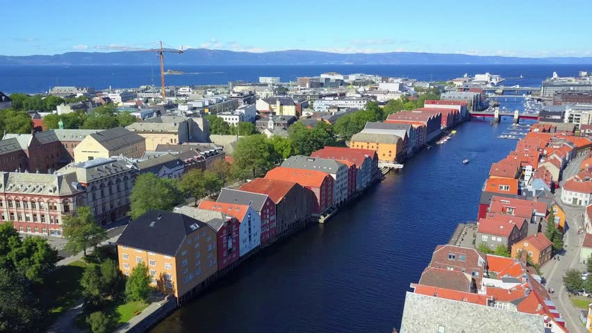Colorful old houses at the Nidelva river embankment aerial view in the center of Trondheim town in Norway