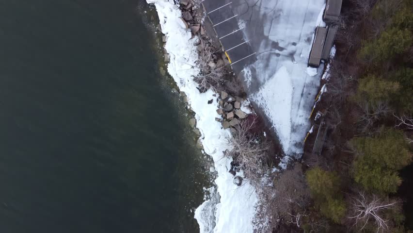 Aerial of Bay Shore Park off of Lake Michigan.  Door County Wisconsin.  Drone shot over Icy Shore Line.