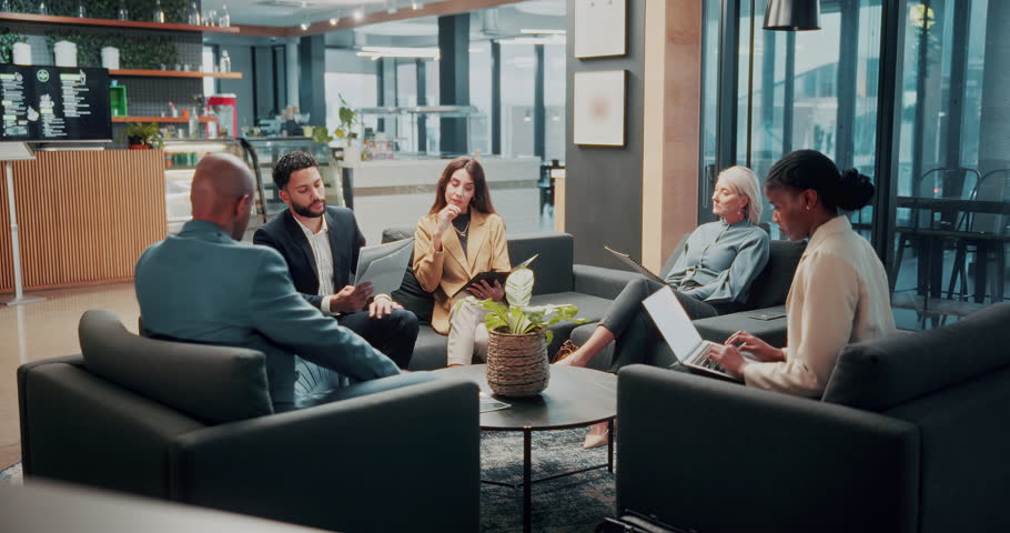 Meeting, talking and teamwork with business people in office lobby for project management. Collaboration, conversation and corporate with employee group at work together for discussion or planning