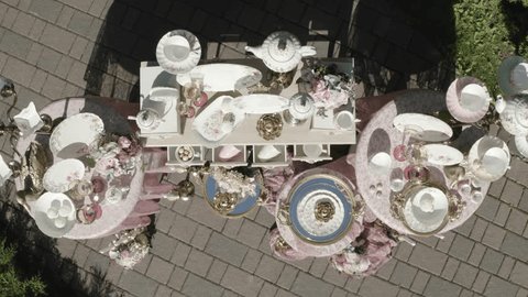 Drone Vertically Ascending above Decorative Table Installation
