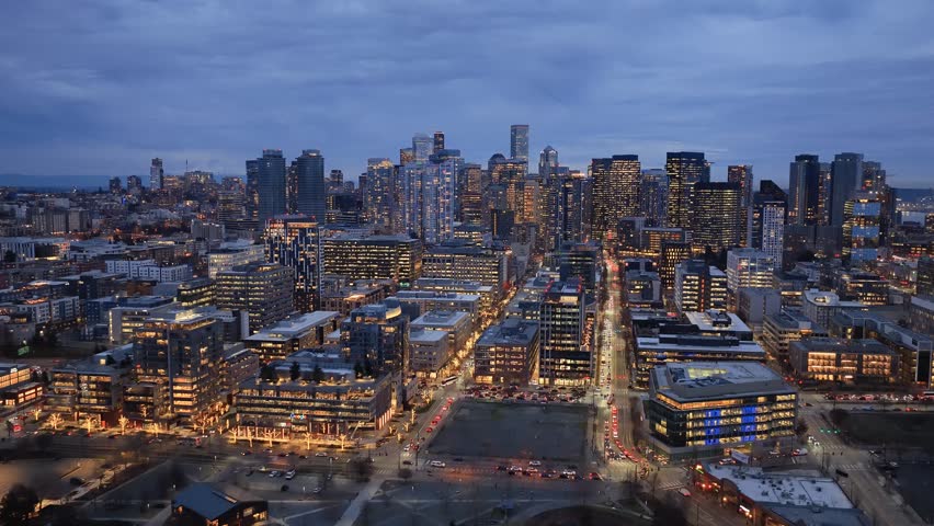 Seattle downtown skyline at blue hour with city lights, traffic and Lake Union park waterfront aerial view, Washington USA. g.