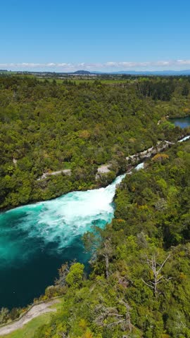 Huka Falls Turquoise Rapids on Waikato River In New Zealand, Aerial Vertical View