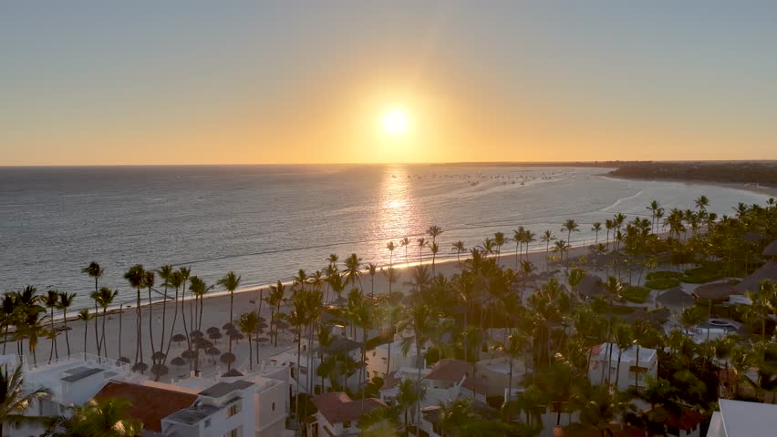 Sunrise Beach At Bavaro In Punta Cana Dominican Republic. Sunrise Skyline. Beach Landscape. Nature Seascape. Sunrise Beach In Bavaro In Punta Cana Dominican Republic. Scenic Palm Trees.
