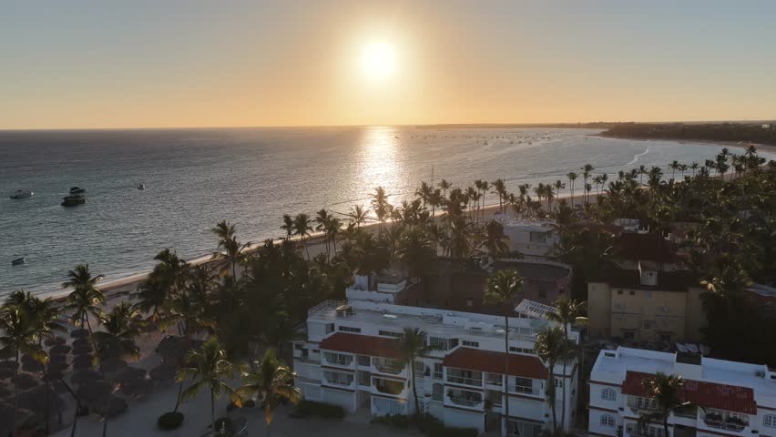 Sunrise Beach At Bavaro In Punta Cana Dominican Republic. Sunrise Skyline. Beach Landscape. Resorts Buildings. Sunrise Beach In Bavaro In Punta Cana Dominican Republic. Nature Background.