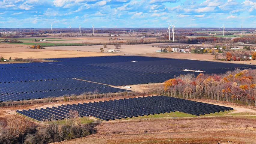 Renewable energy production system in Michigan, USA with solar panels and wind turbines
