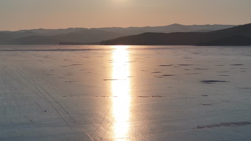 Beautiful blue ice of Lake Baikal in winter, Siberia, Russia. 