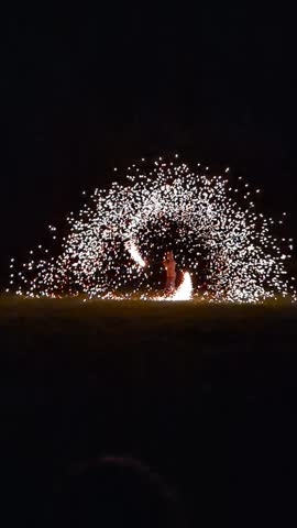 slow motion fire dancer display 