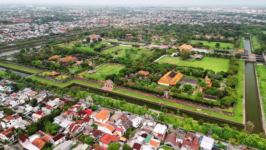 Aerial view of hue imperial city, the citadel of the nguyen dynasty in vietnam with the forbidden purple city, a unesco world heritage site.